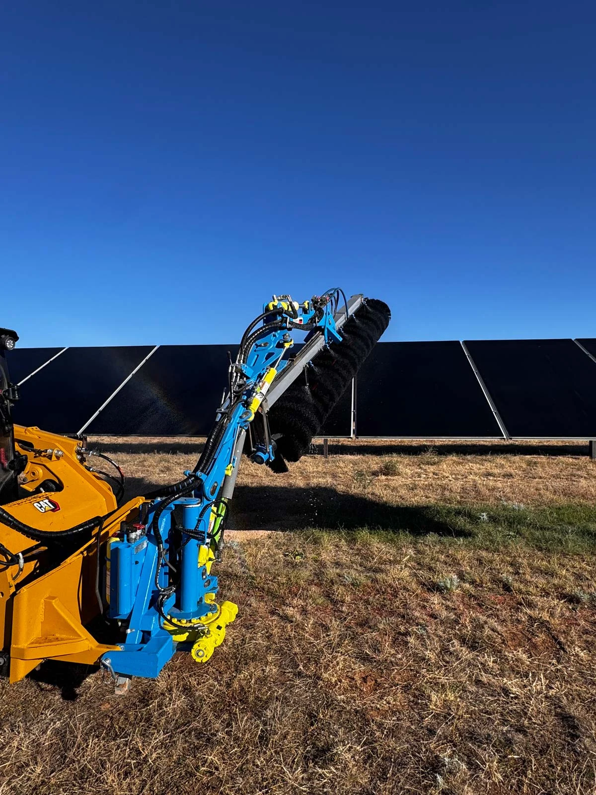 US-Solar-Cleaning-Photo1-1200px US Solar PV Module Cleaning Commercial Solar Panels Being Cleaned Using Our Proprietary PV Module Cleaning Process From Left To Right In A Field 1200px x 1600px