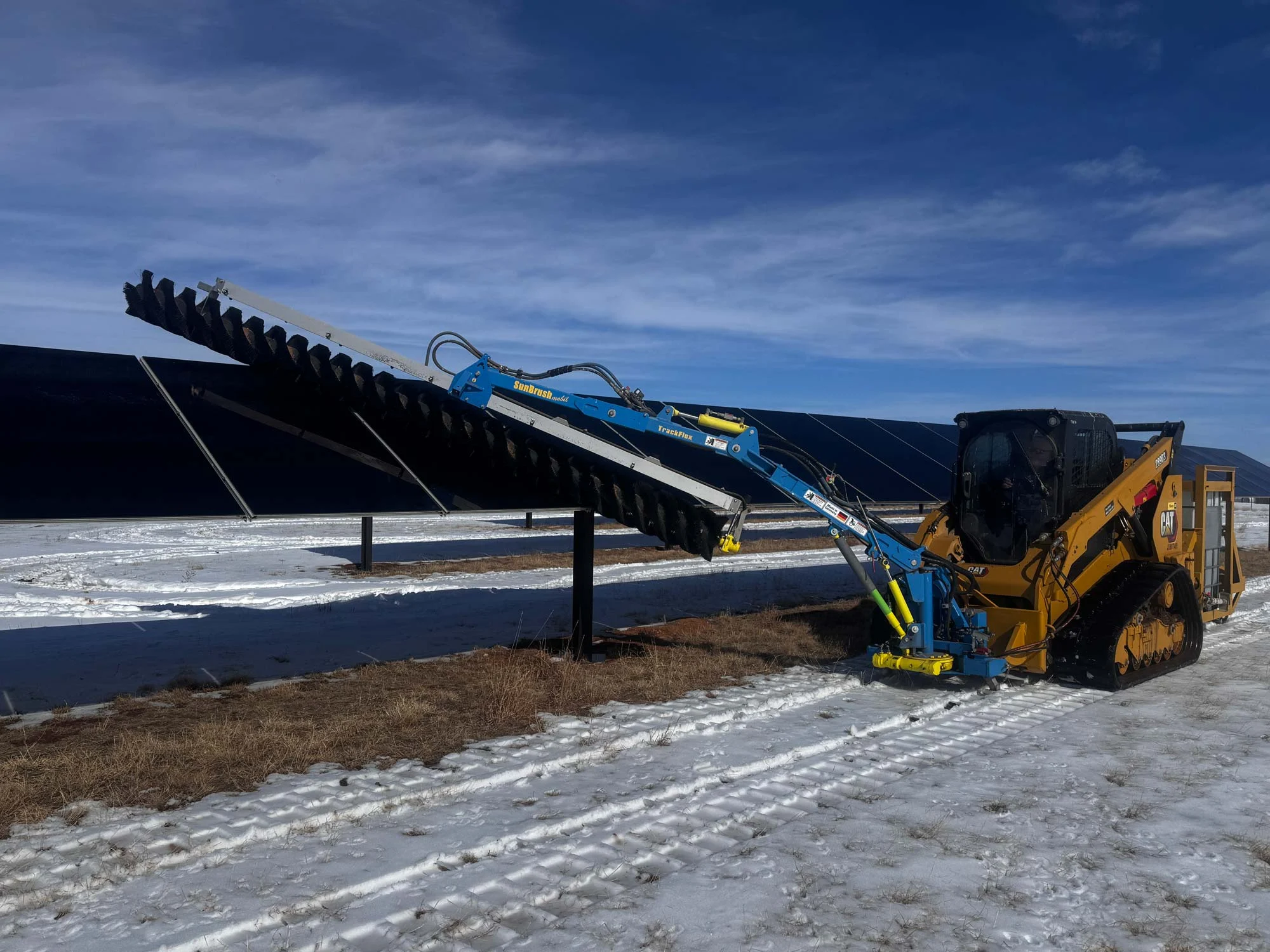 US-Solar-Cleaning-Photo5-2000px US Solar PV Module Cleaning Commercial Solar Panels Being Cleaned Using Our Proprietary PV Module Cleaning Process From Right To Left in the Snow 2000px x 1500px