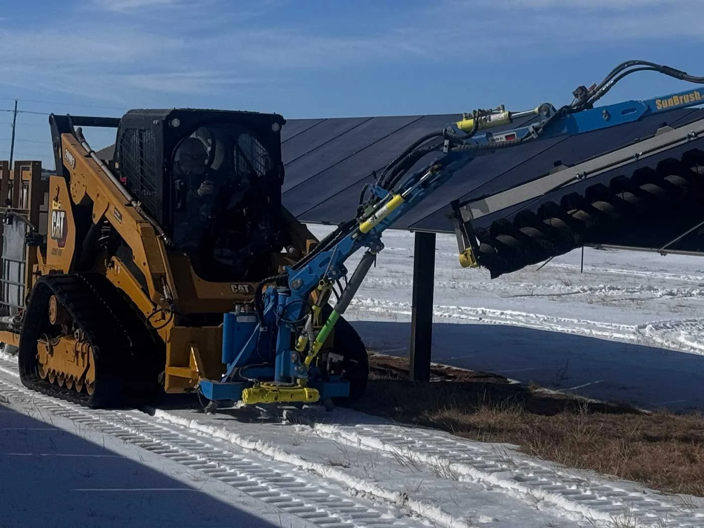 US-Solar-Cleaning-Technician-1400px US Solar PV Module Cleaning Commercial Solar Panels Being Cleaned Using Our Proprietary PV Module Cleaning Process From Left To Right In The Snow 1400px x 1050px